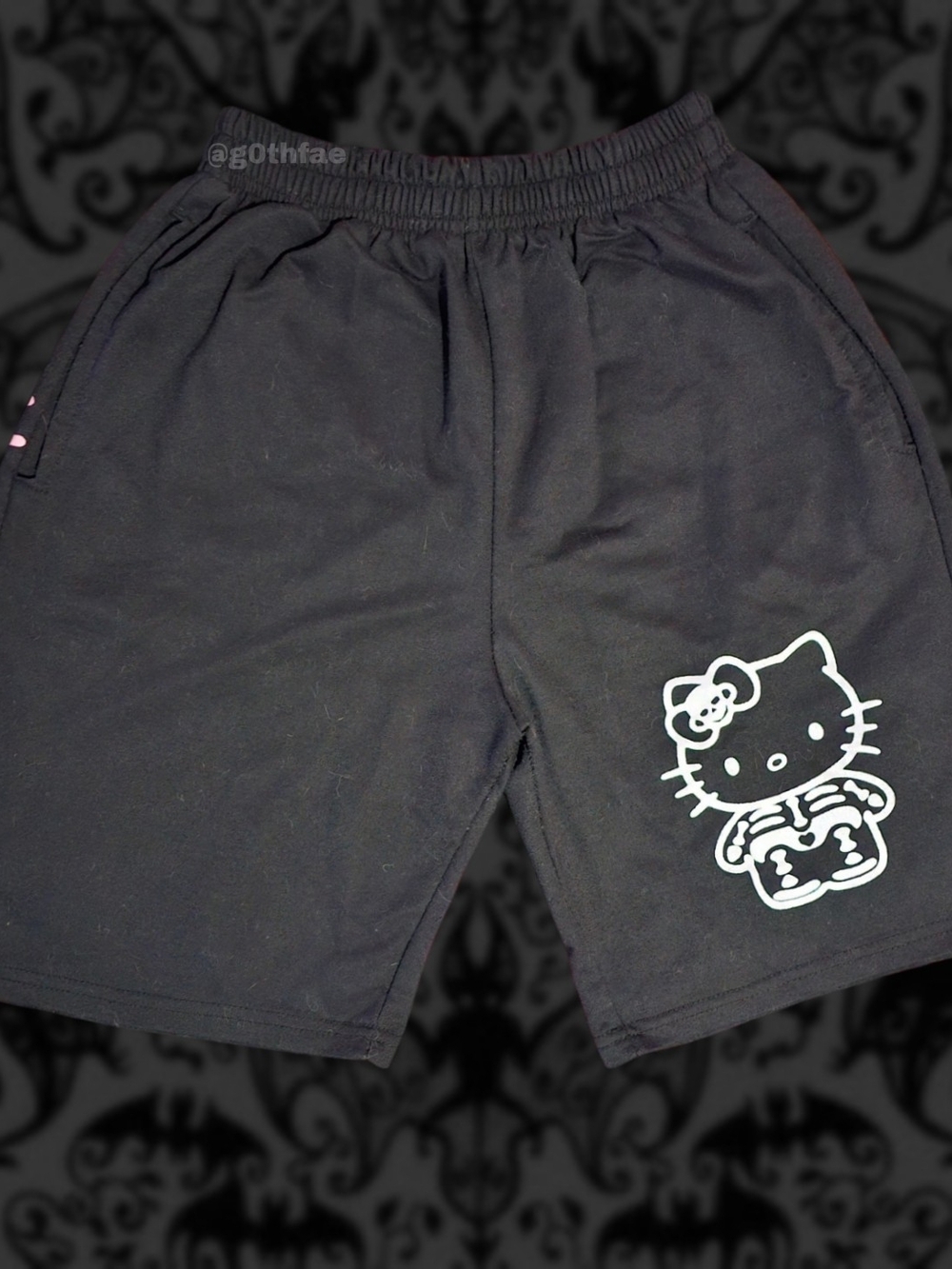 Skeleton Hello Kitty Graphic Bermuda Shorts with White HK & Pink Text Details